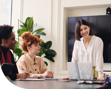 young women running a meeting
